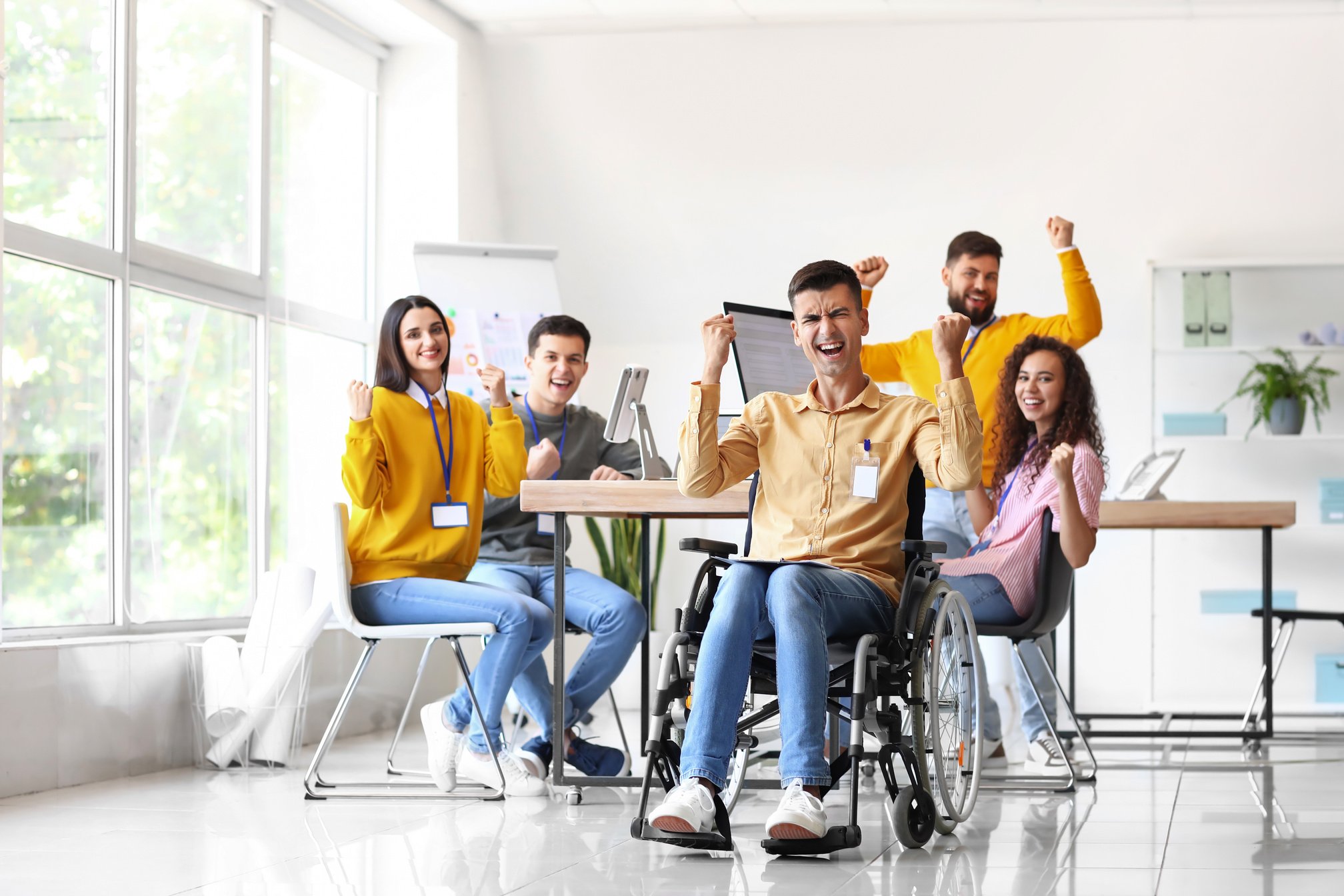 Happy Young Business People Working in Office